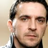 Marco Zangardi as On. Rognati
