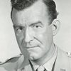 Crahan Denton as John Egan