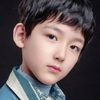 Yuan Jinhui as Four Eyes (Child)