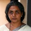Shobha Mohan as Ullas's Mother