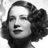 Lya Lys as The Woman