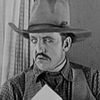 Lew Meehan as Flynn--Crewman