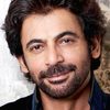 Sunil Grover as Sampat / Sanjay Singhania