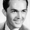 Kirk Alyn as Superman, alias Clark Kent