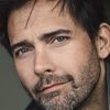 Andrew Bowen as John