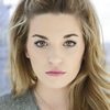 Carly McKillip as Regina Walker