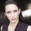 Andrea D'Amours as Office Worker