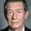 John Hurt as Villano
