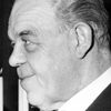 Kai Holm as Prime Minister Staldhybel