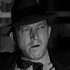 Billy Wayne as Man in Car