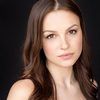 Kayla Wallace as Emily Mariposa