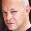 Neil Summerville as The Overseer