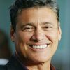Steven Bauer as Archie Touraine