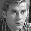 Mykola Sektymenko as Stas Gomenyuk, collaborationist policeman