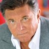 Larry Manetti as ThomGrady