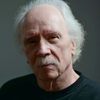 John Carpenter as Norwegian (video footage) (uncredited)