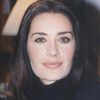 Tania Kapsali as Kiki Koutra