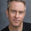 Jonathan Rhodes as Reporter