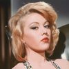 Margaret Nolan as Buxom Lass