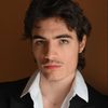 Elliott Mitrani as The young dealer