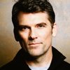 Robert Farrior as Oliver North