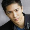 Brian Ho as Prison Guard