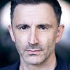 Daniel Caltagirone as Carlos Rega