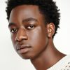 Ayo Solanke as Tucker