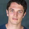 Colin Woodell as Alex
