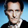Peter Cushing as Professor Lawrence Van Helsing