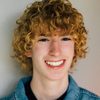 Zachary Colmenero as John Williams