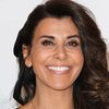 Reem Kherici as Caroline