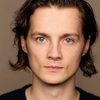 George Webster as Charlie
