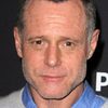 Jason Beghe as Eric