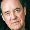 Shaun Lawton as John Magee