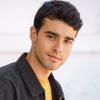 Noah D'Annunzio as Photographer