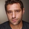 Duane Behrens as Captain Paz