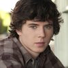 Charlie McDermott as T.J.