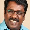 Balu Anand as Train Ticket checker for the Coromandel Express[