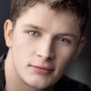 Brett Dier as Aaron
