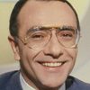 Yves Mourousi as News presenter