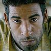 Mohamed Akhzam as Prof. Hayden Masterton Right hand
