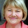 Annette Badland as Daisy, the Shopkeeper