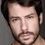 Alejandro Albarracín as Spanish Radio News Reader(voice)