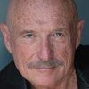 Ken Farmer as Mission Controller