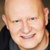 Ted Ludzik as Bellini, the Bookbuilder