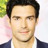 Peter Porte as Travis Walsh