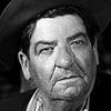 Frank Mills as Man in Crowd Outside Shop (uncredited)