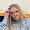 Iryna Tamim as Russian Mother 2