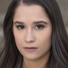 Michelle Macedo as Emilia 'Emmy' Mendoza